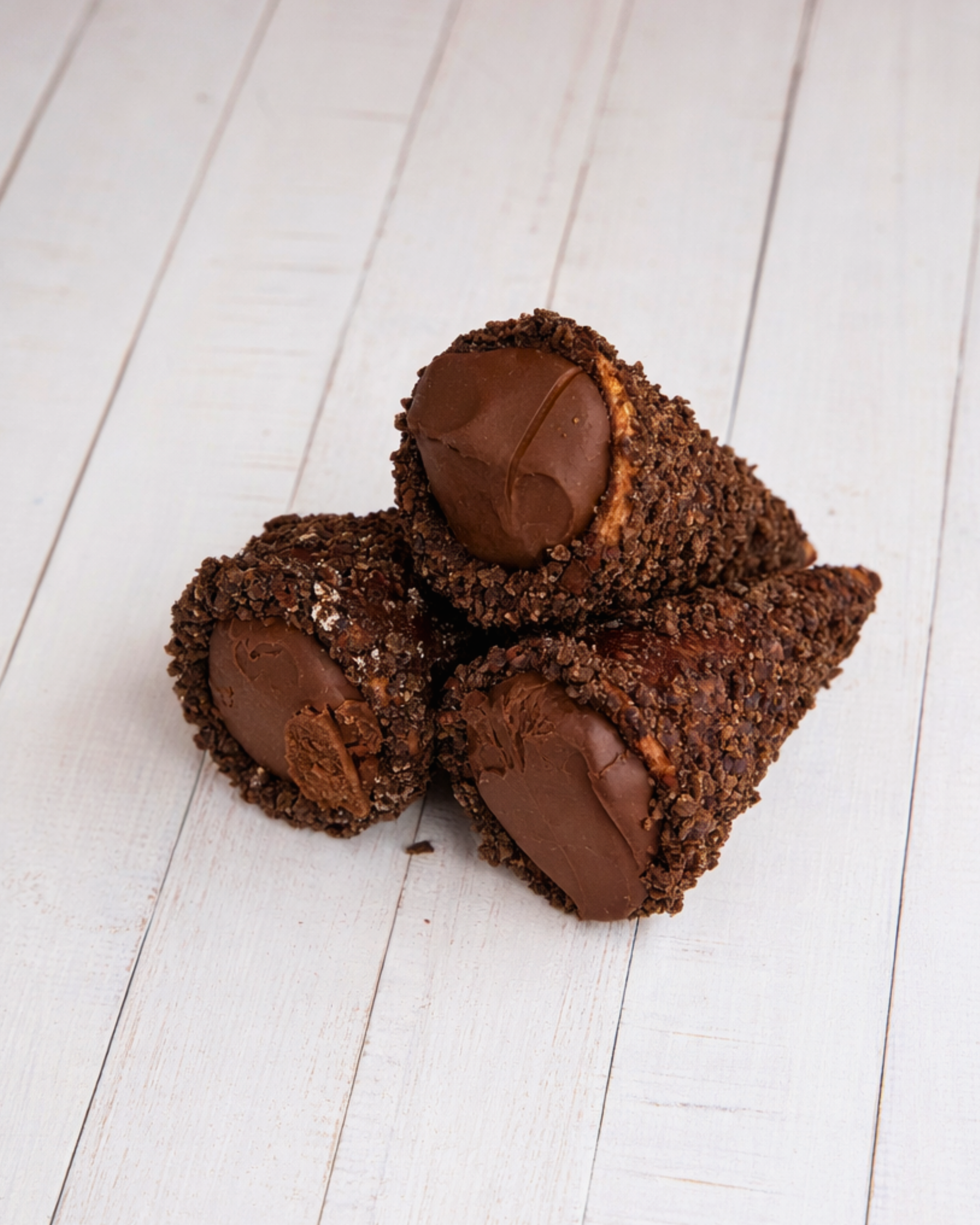 Medri Trottole Chocolate, a decorative chocolate piece with intricate swirl design, showcasing rich, glossy cocoa finish.