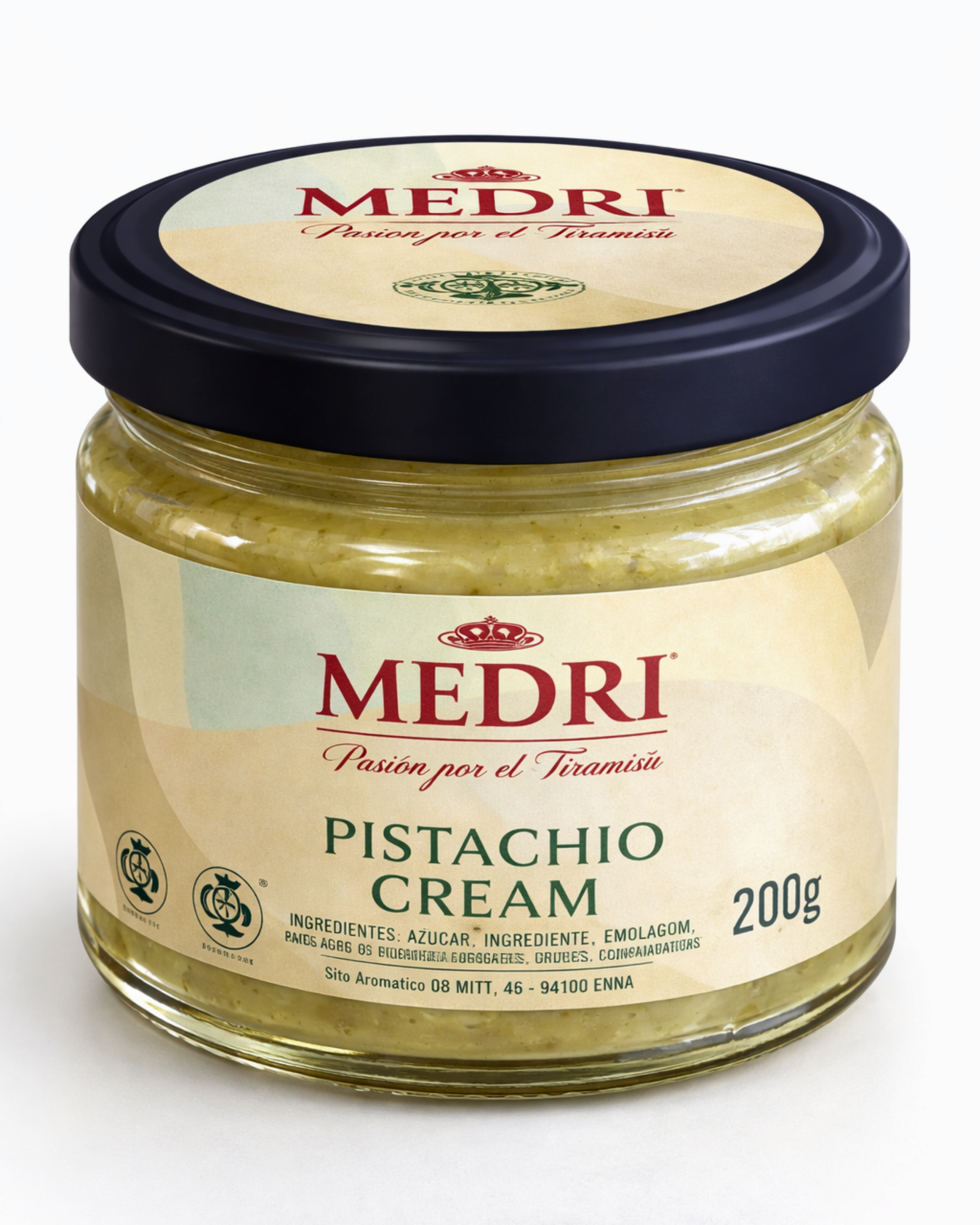 Creamy pistachio spread with 25% pistachio content from Medri Tiramisu Cafe, shown in a jar with smooth texture and green hue.