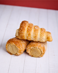 Medri Cannolino Sfoglia Pistacho with layered pastry and pistachio filling, showcasing its delicate, colorful confection.