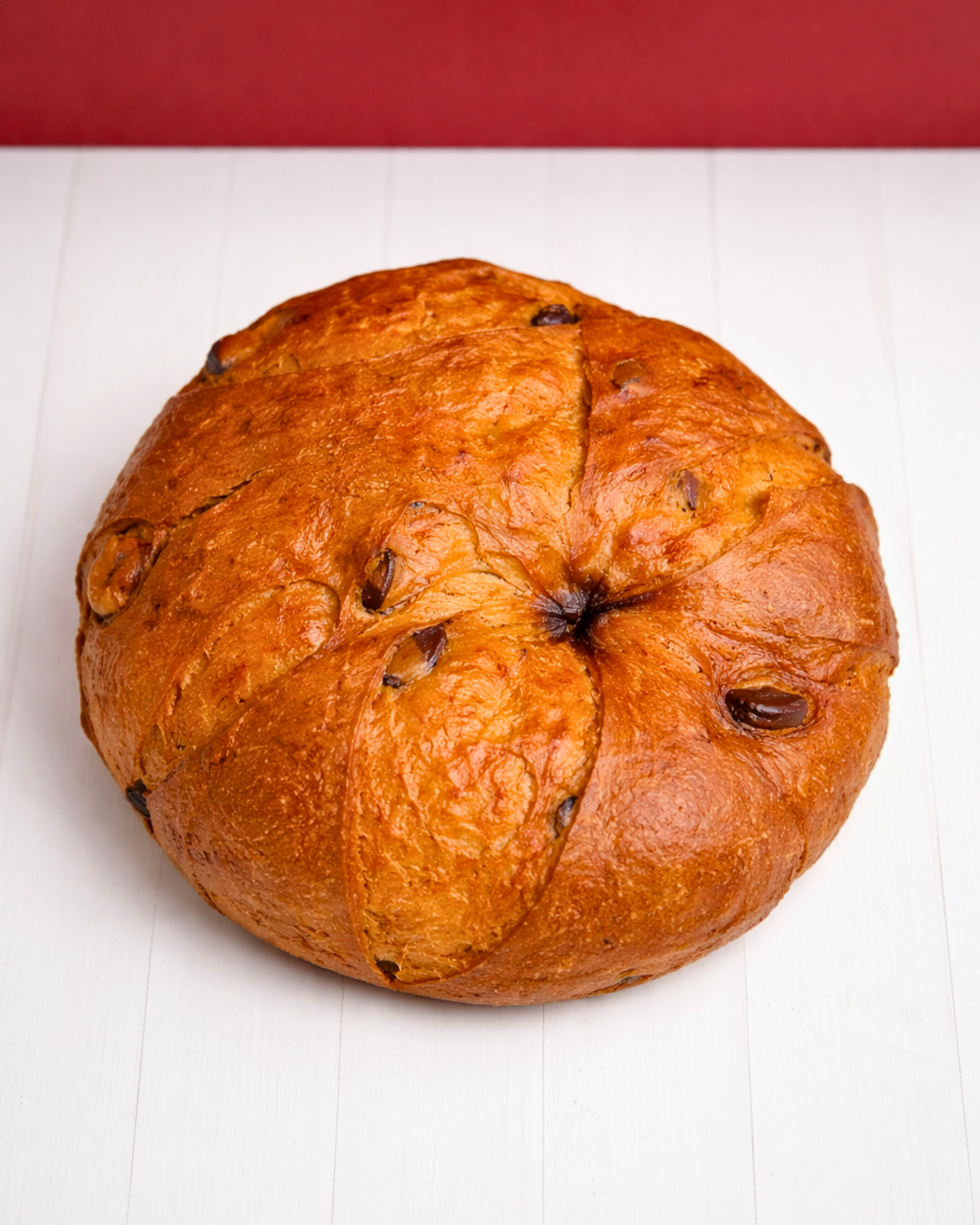 Medri Panettone Classico Negrini with golden, fluffy bread and candied fruit slices, traditional Italian Christmas dessert.