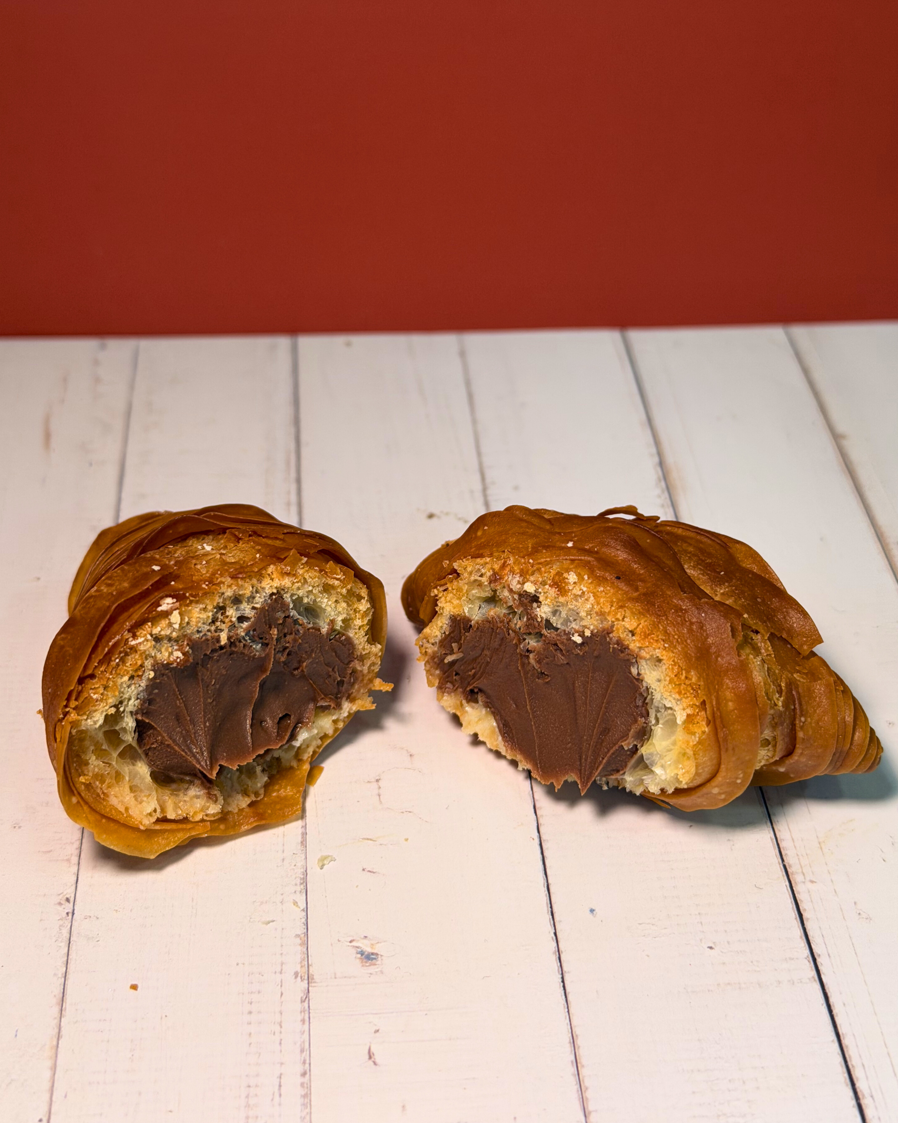 Chocolate sfogliatella pastry by Medri with flaky golden layers and rich chocolate filling, ready to enjoy.