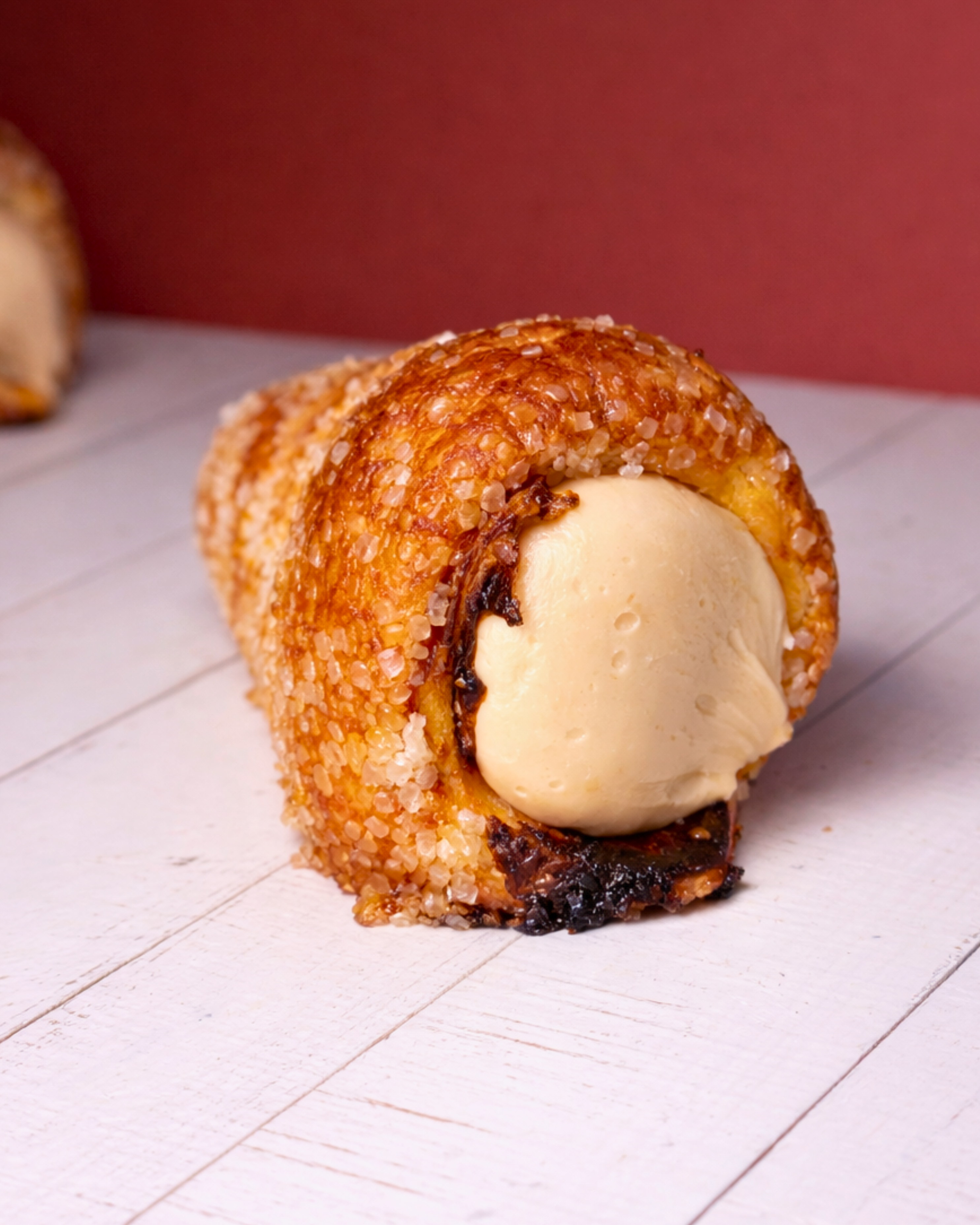 Medri Cannolino Sfoglia Tiramisú dessert with layered pastry and creamy filling in a clear glass dish.