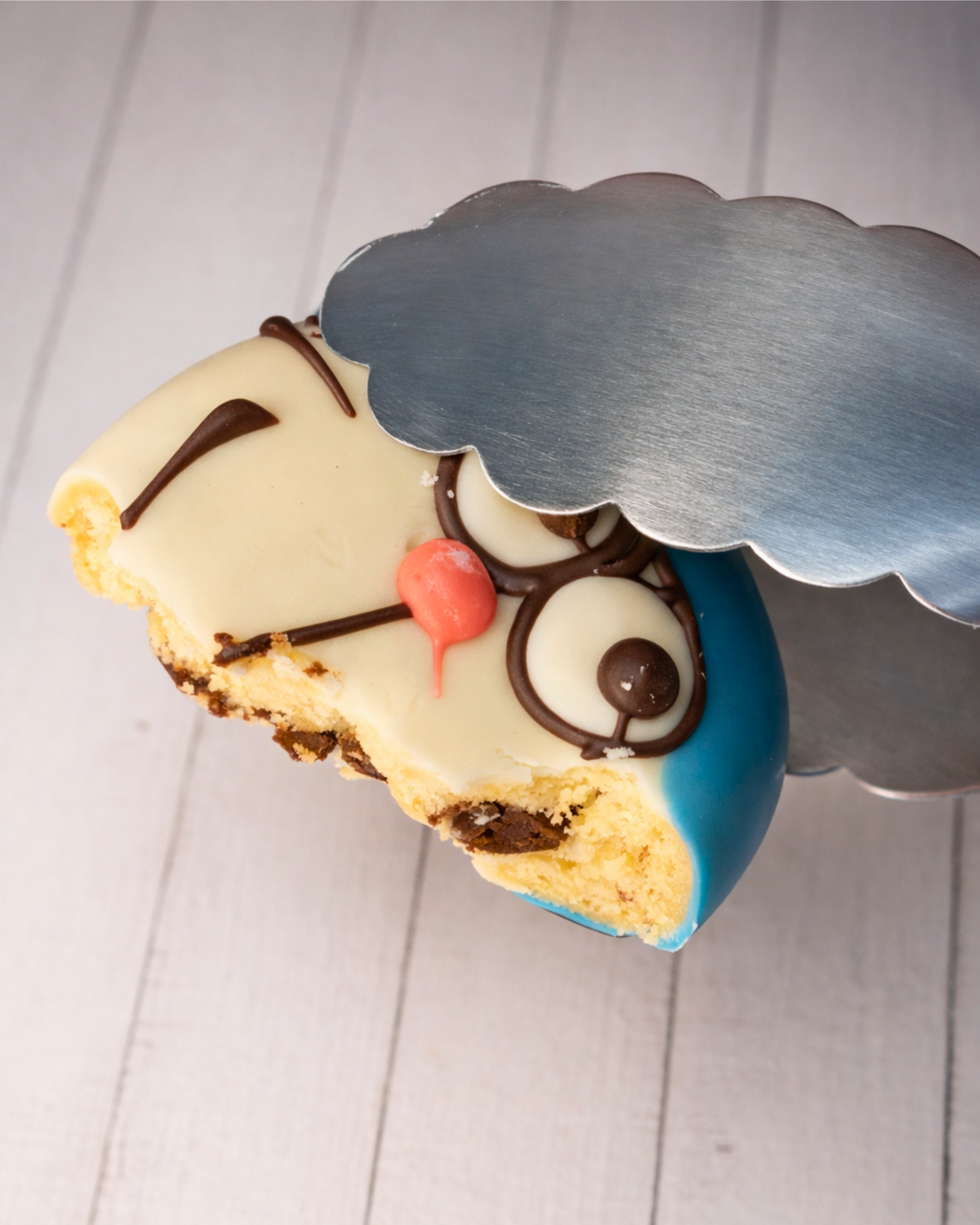Chocolate-filled Doraemon dessert by Medri Tiramisu Cafe featuring a cute Doraemon character with rich chocolate filling.