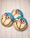 Doraemon-shaped chocolate-filled pastries from Medri Tiramisu Cafe, featuring detailed chocolate and pastry exterior.