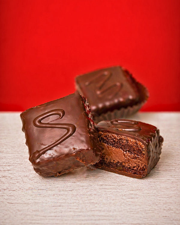 Mini chocolate Saker from Medri Tiramisu Cafe, showing a close-up of the small, chocolate-filled dessert on a plate.