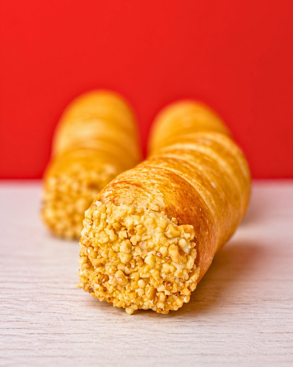 Cannolino dessert with caramel salted topping from Medri Tiramisu Cafe, topped with caramel drizzle and creamy filling.