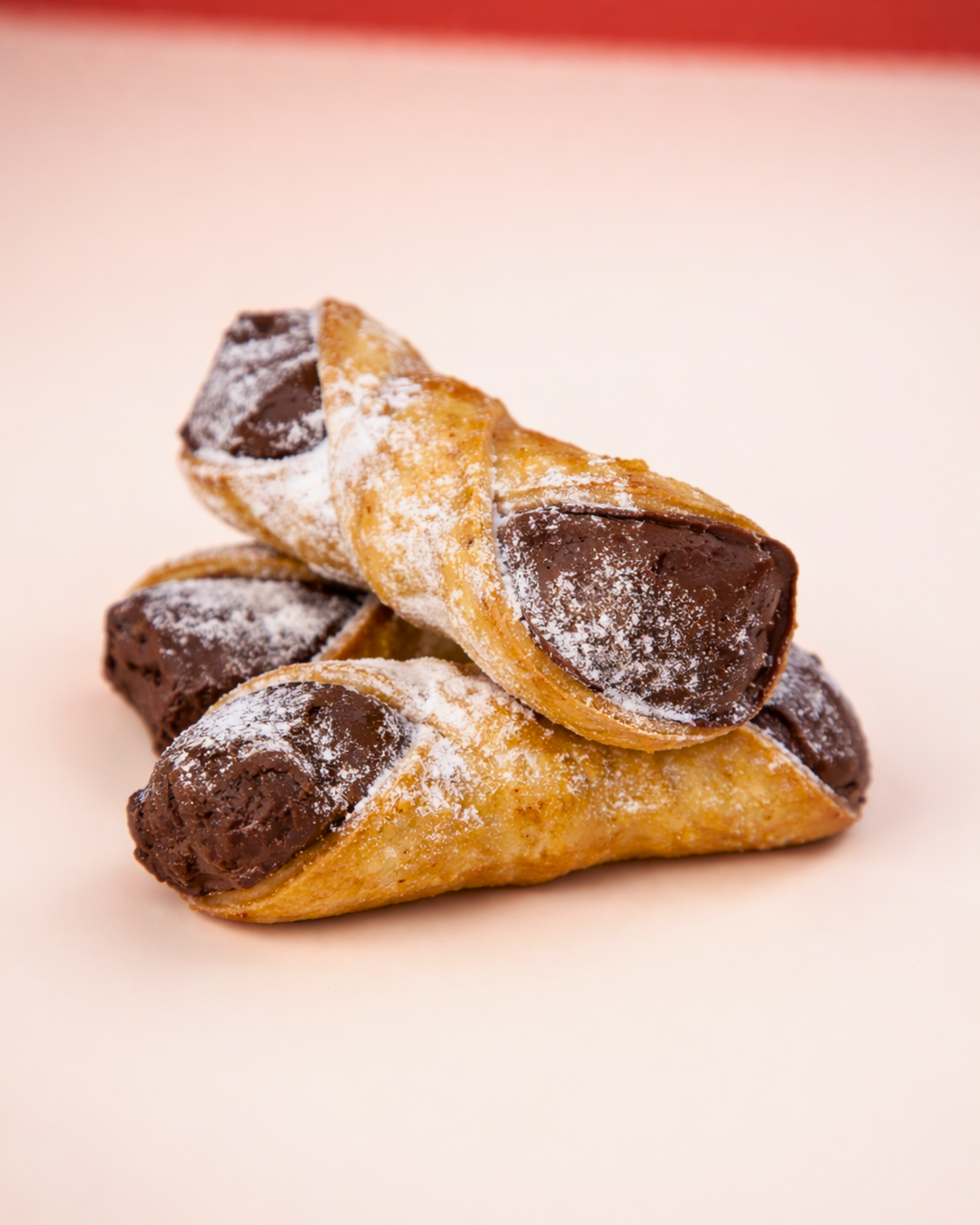 Medri Cannolino Siciliano Chocolate, a close-up of a traditional Sicilian chocolate confection with detailed textures and rich appearance.