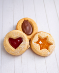 Assorted Medri Occhi di Bue Mixto cookies in a box, featuring a variety of traditional Italian biscotti with chocolate and cream fillings.