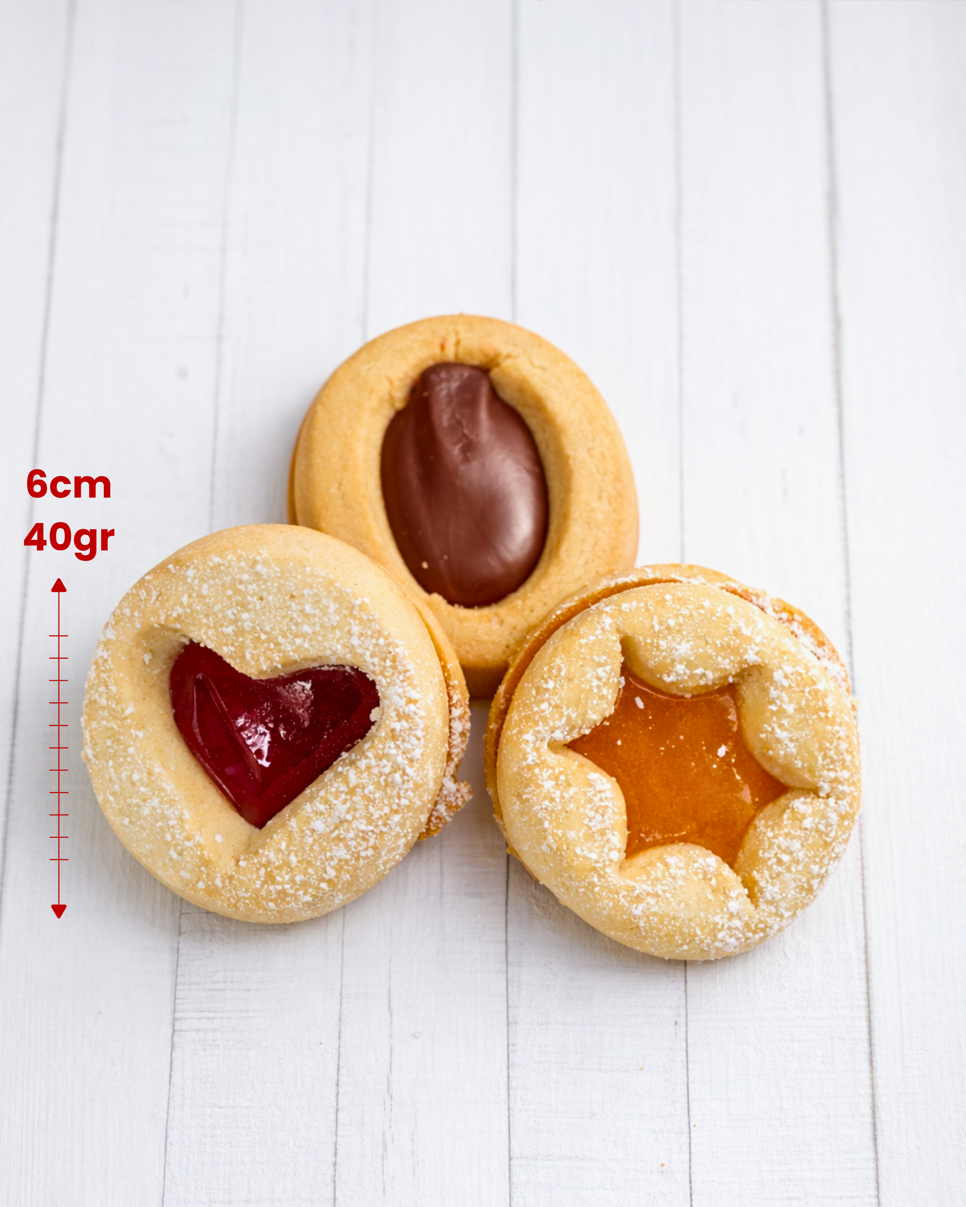 Medri Occhi di Bue Mixto assorted cookies in a box, showing a variety of colorful, round, glazed cookies with different toppings.