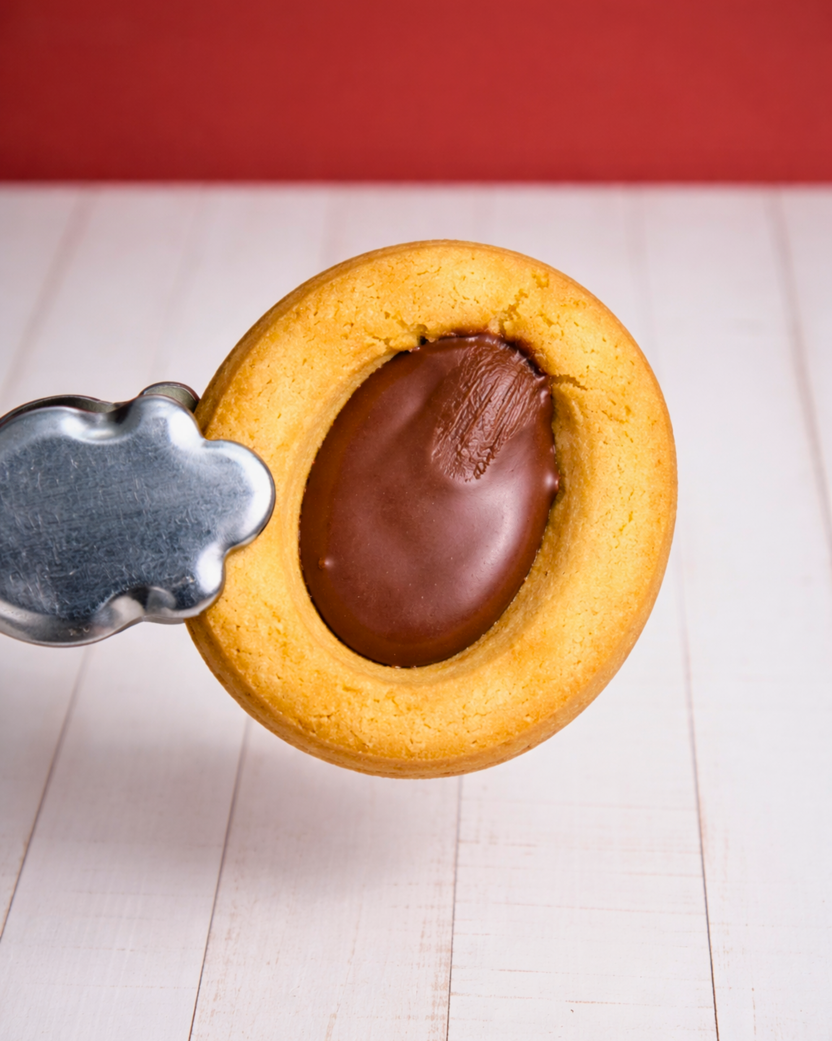 Assorted Medri Occhi di Bue Mixto cookies in a box, featuring a variety of colorful, round Italian biscuit treats.