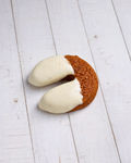 Medri Ferri di Cacao, small dark chocolate bars with a textured surface, displayed on a white background.