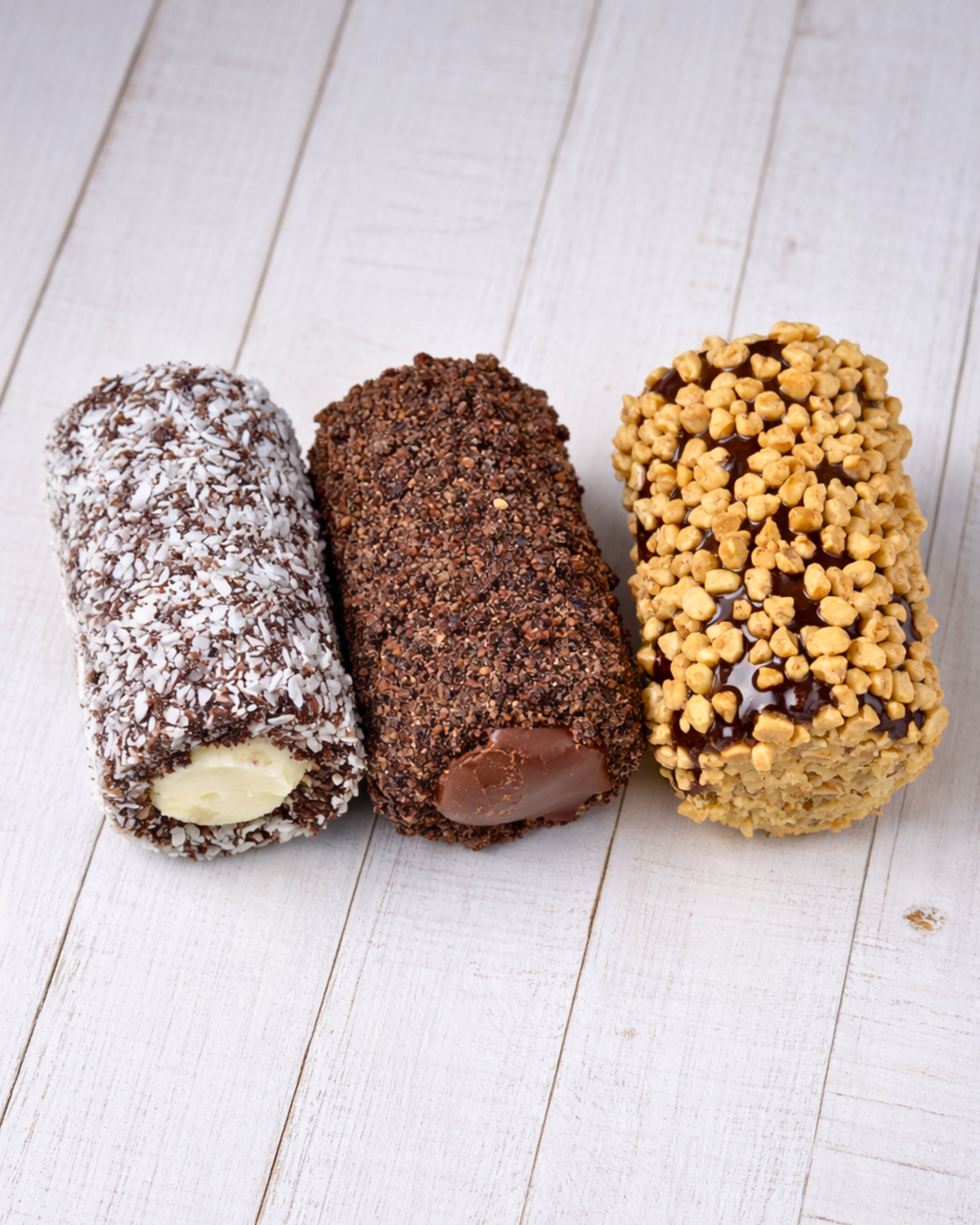 Assorted Medri Cannolli Twill box with colorful, decorative pastry shells and creamy filling, presented in an elegant gift box.