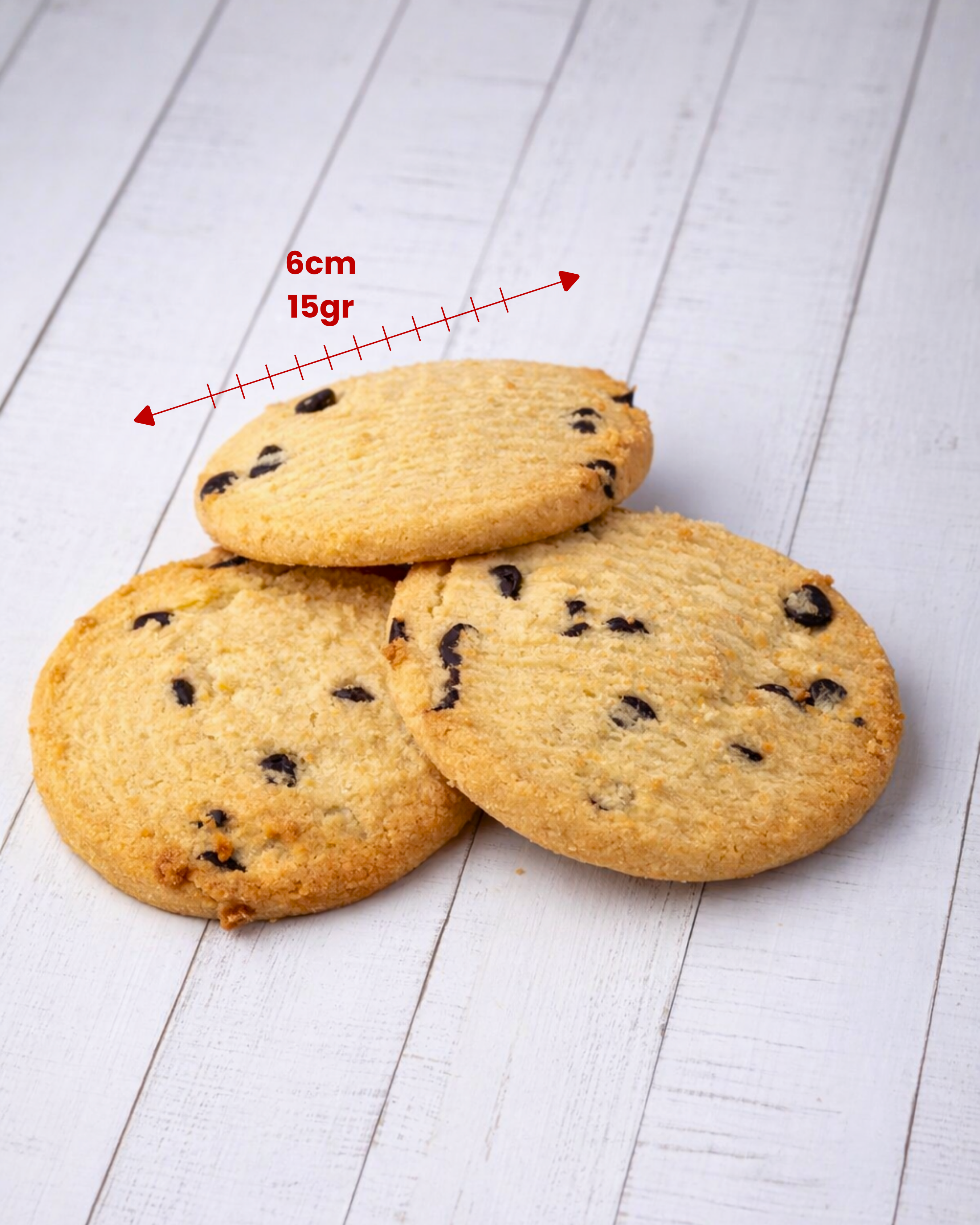 Chocolate cookies by Medri, featuring a crispy texture with rich chocolate flavor, displayed on a white plate.