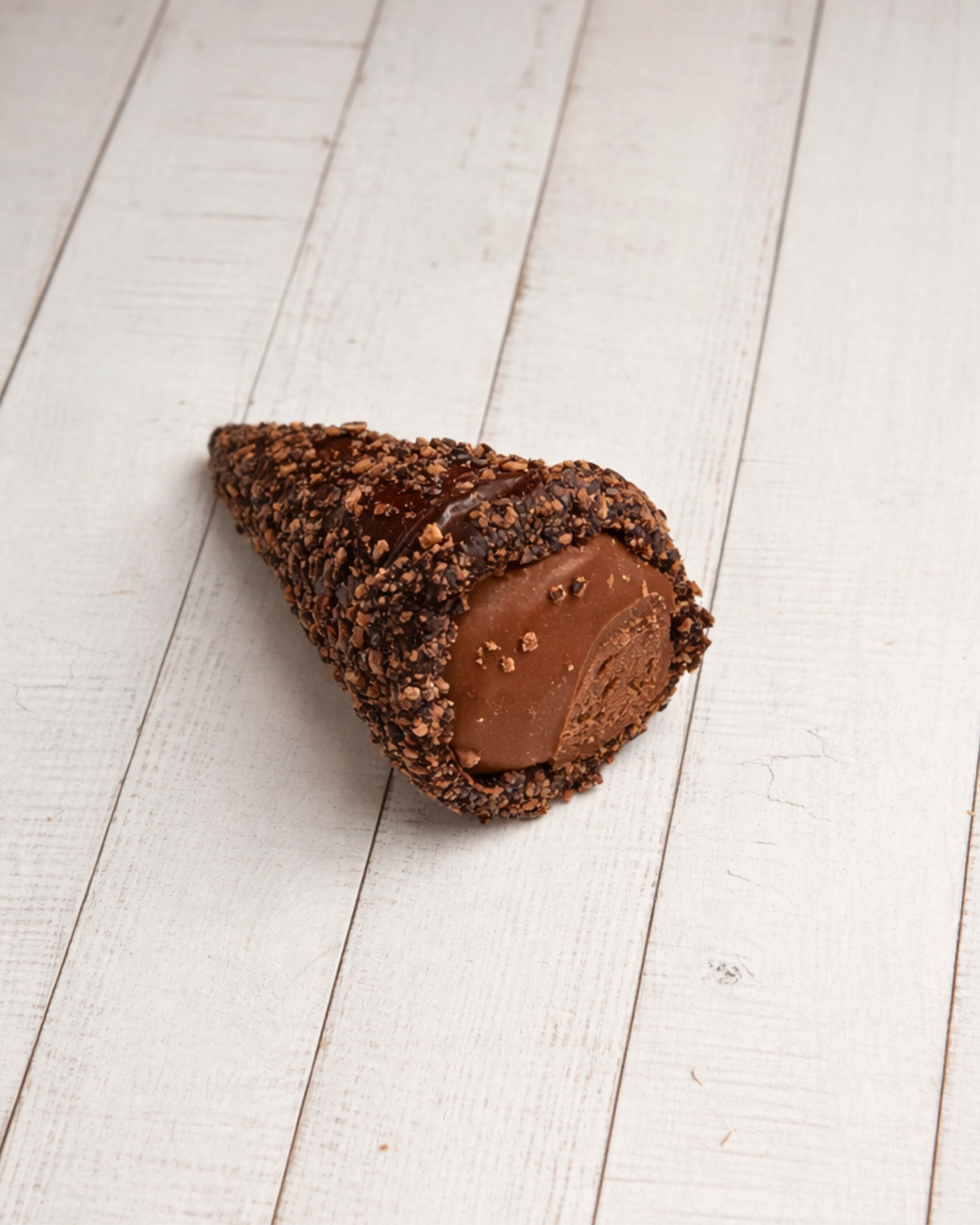 Medri Trottole Chocolate, colorful spinning top toys with chocolate-inspired design, displayed on a neutral background.